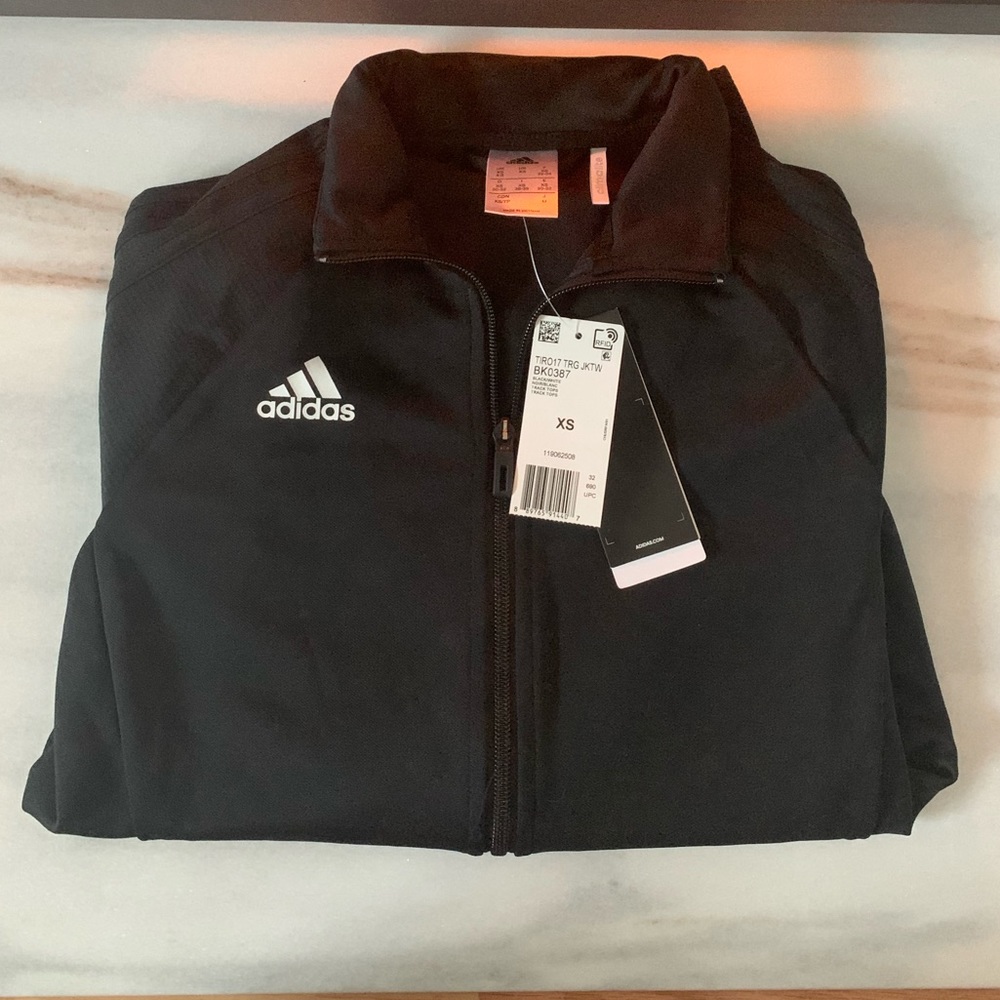 ADIDAS jacket, never worn. SIZE XS